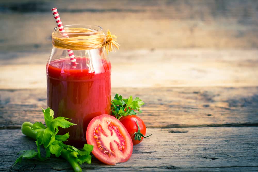 ống nước gì để giảm mỡ máu? Nước ép cà chua