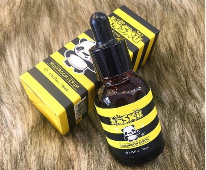 chai serum bằng thủy tinh nhãn sọc vàng đen